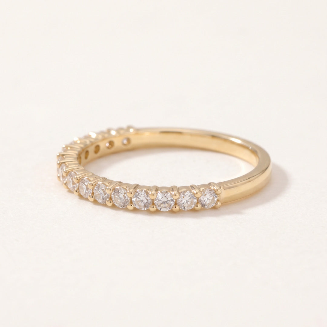 Thirteen diamond half eternity ring in 14K yellow gold — angled view