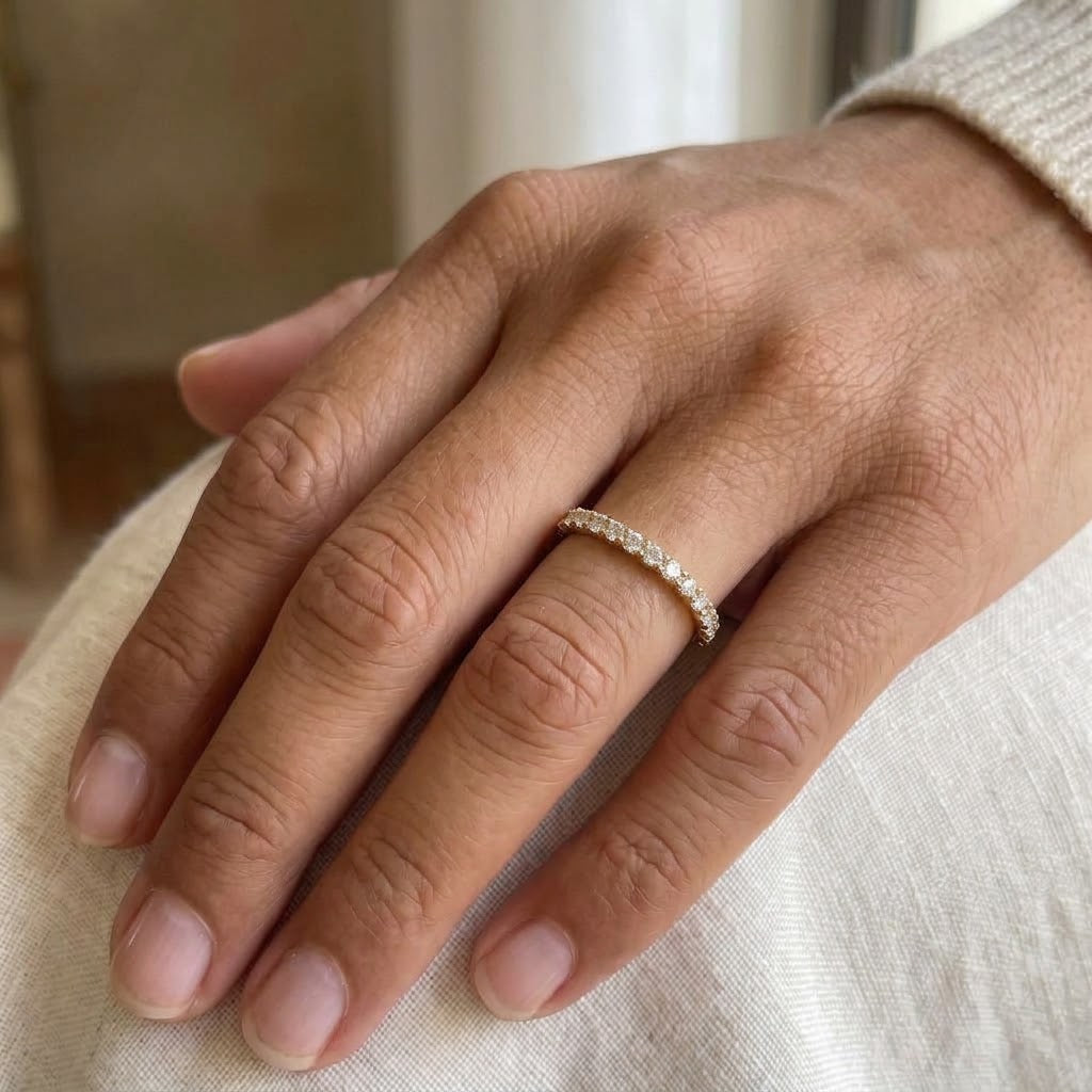 Thirteen diamond half eternity ring in 14K yellow gold — worn on hand