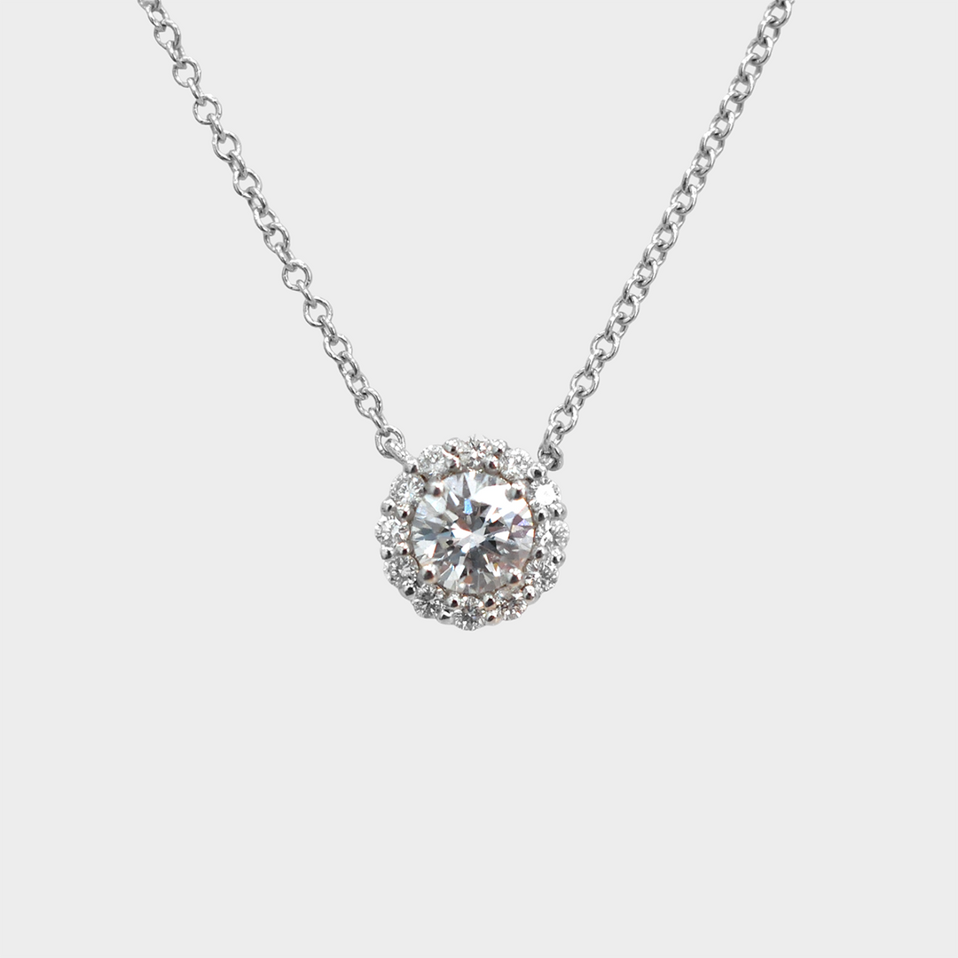 0.35 Carat Center Diamond and Diamonds halo pendant.