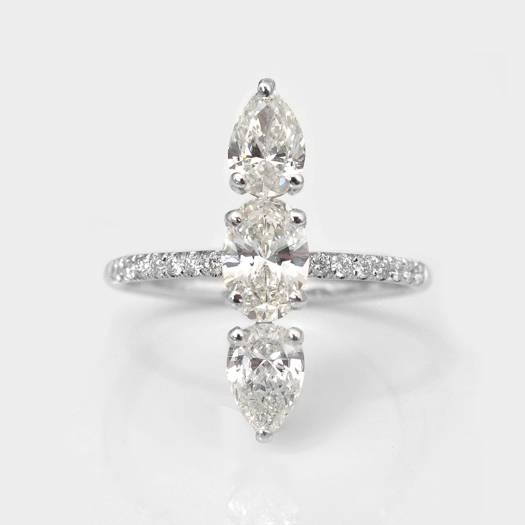 Three Stones Pear and Oval White Diamonds Ring