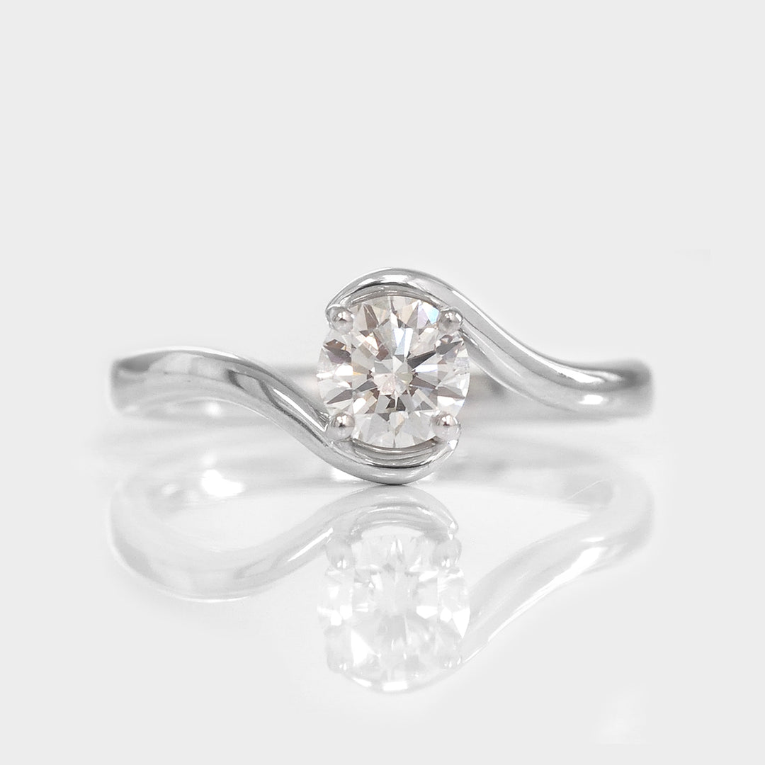 White Diamond twist style Solitaire Ring in White Gold