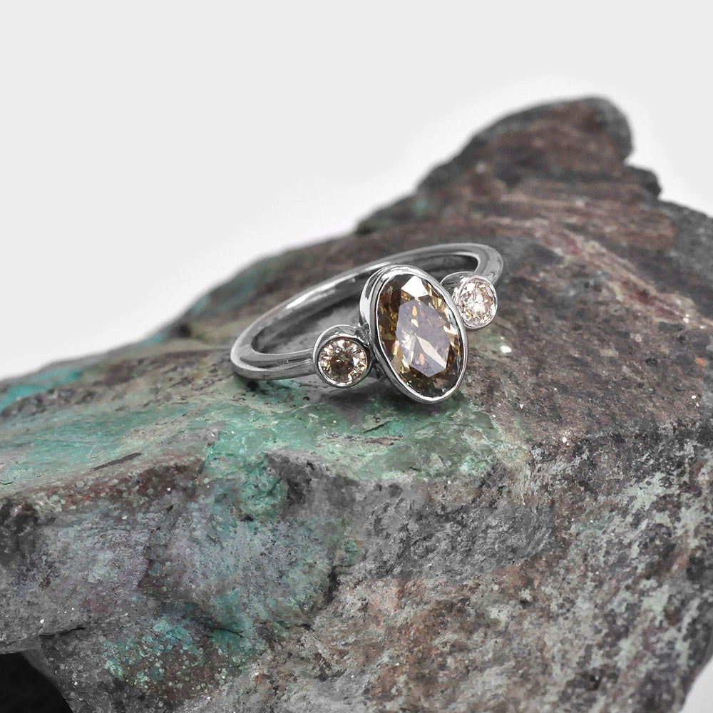 Bezel Set Three Stones Oval & round diamonds Ring