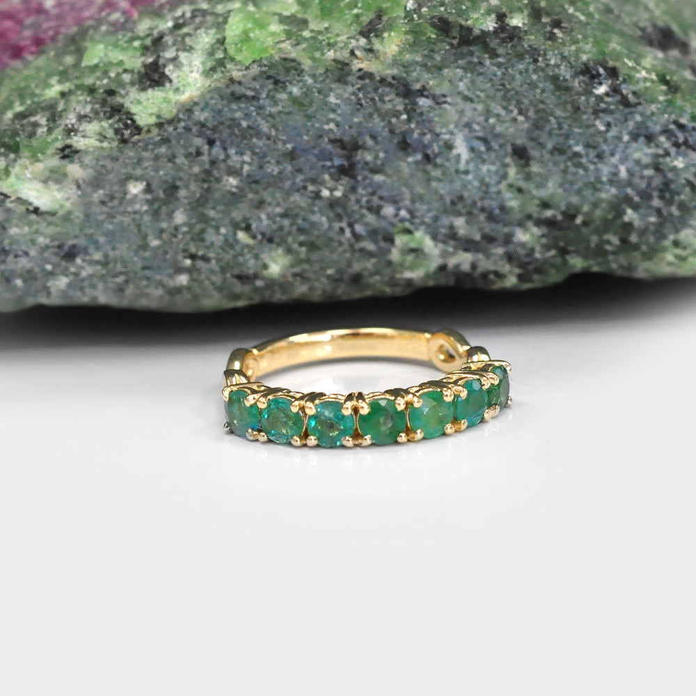 Seven Round Emeralds Ring in Yellow Gold
