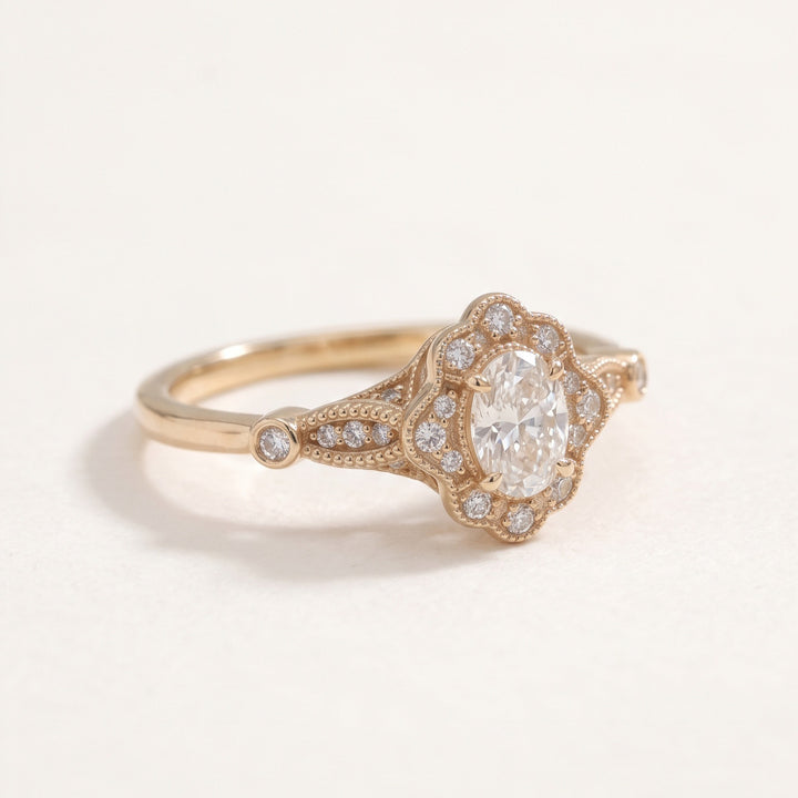 Vintage oval diamond halo ring in 14K rose gold / טבעת יהלום אובלי בהילה בסגנון וינטג׳ בזהב ורוד 14K - Opposite angle / מבט מהצד השני