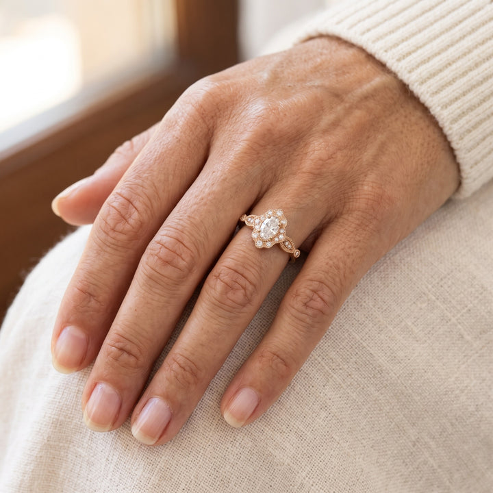 Vintage oval diamond halo ring in 14K rose gold / טבעת יהלום אובלי בהילה בסגנון וינטג׳ בזהב ורוד 14K - Worn on a hand / על היד
