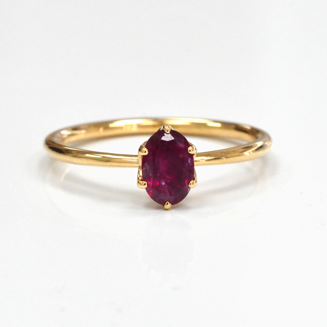 Oval cut red unheated ruby 18k gold Solitaire