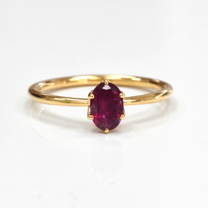 Oval cut red unheated ruby 18k gold Solitaire