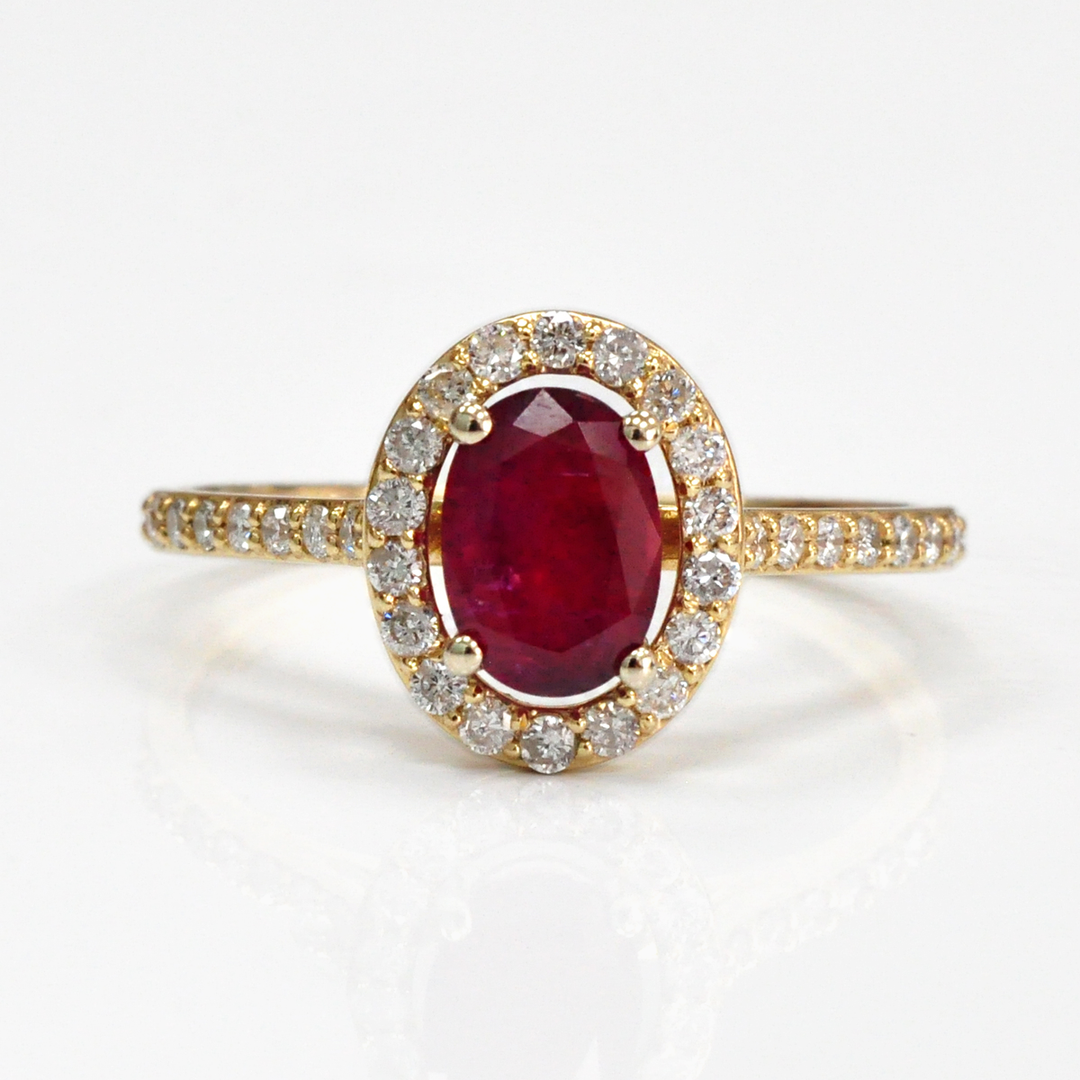 Oval cut red unheated ruby & diamonds halo ring