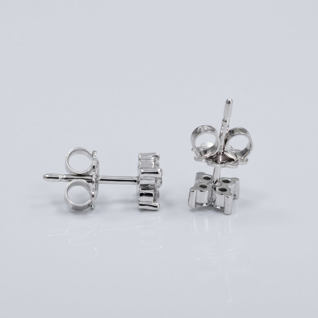 Natural diamond flower stud earrings in 14K white gold — butterfly backs