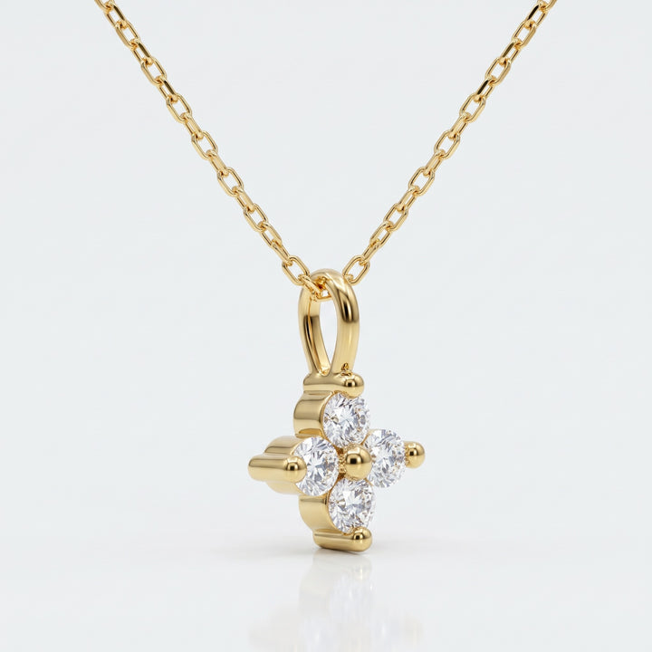 Four natural diamond flower pendant in 14K yellow gold — side view