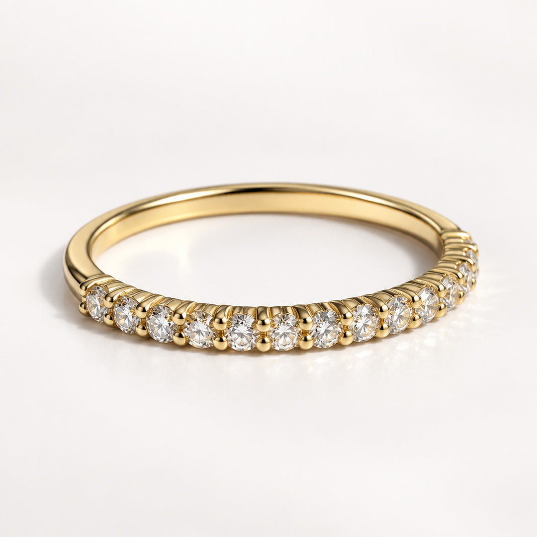 Natural diamond half-eternity ring in 14K yellow gold, angled view
