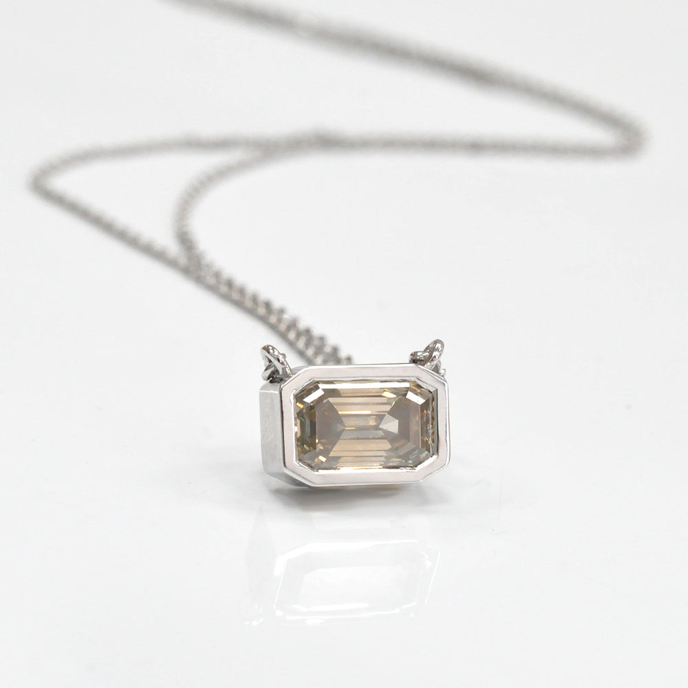 bezel set emerald cut brown diamond pendant