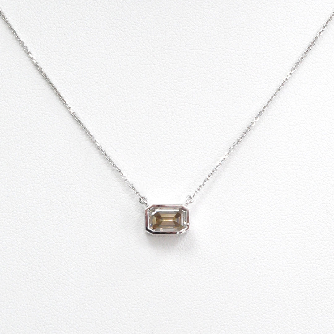 bezel set emerald cut brown diamond pendant