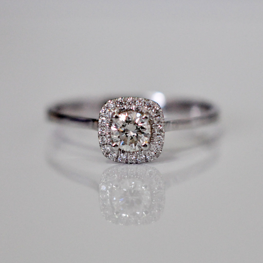 WHITE GOLD AND WHITE DIAMONDS HALO RING