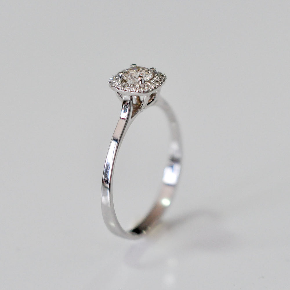 WHITE GOLD AND WHITE DIAMONDS HALO RING