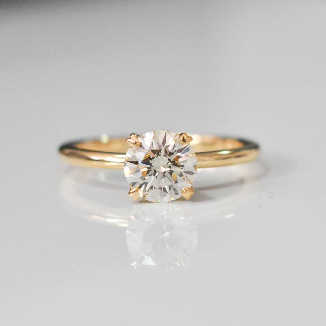 four prongs 1.5 carat diamond solitaire engagement ring