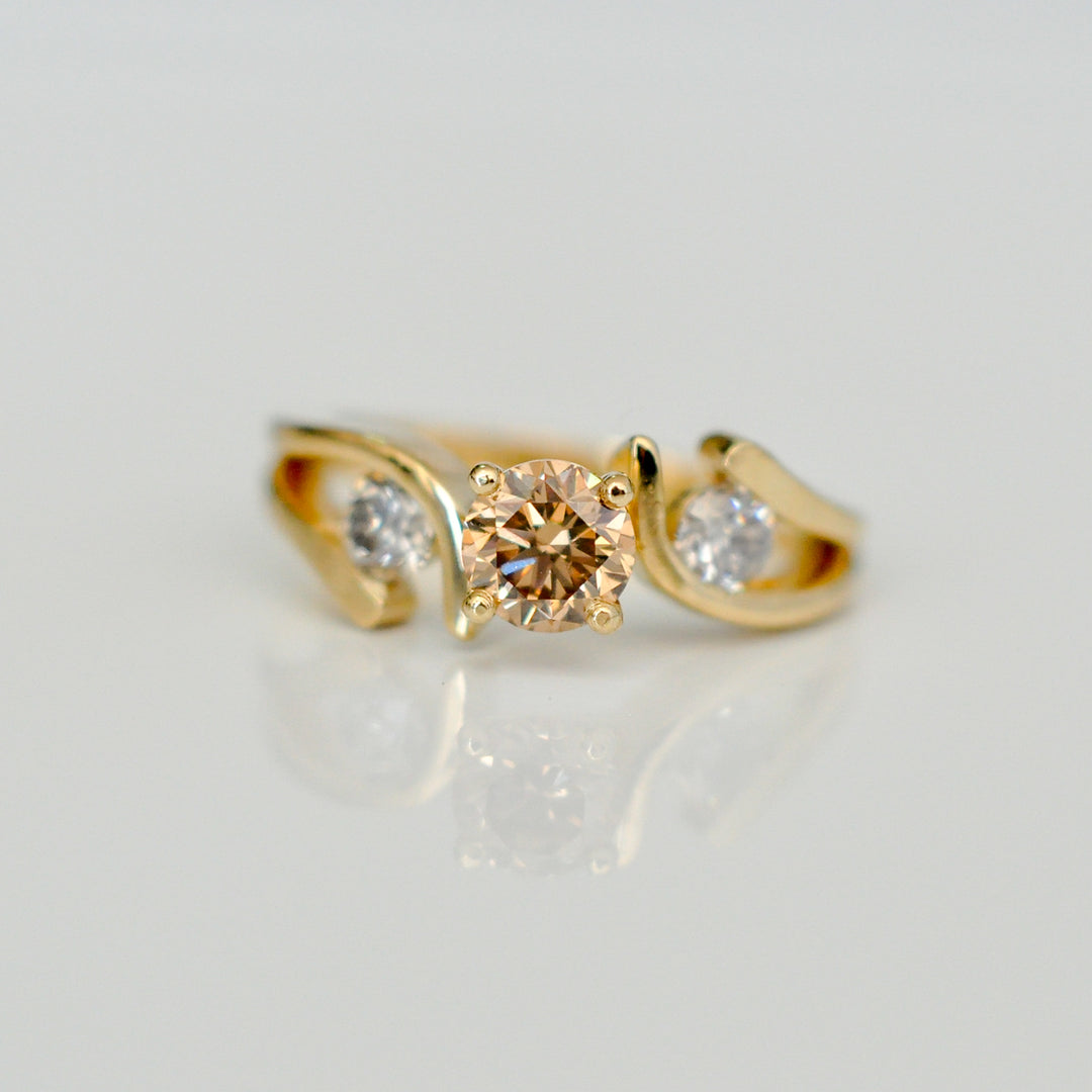 Fancy color diamond with yellow gold ring