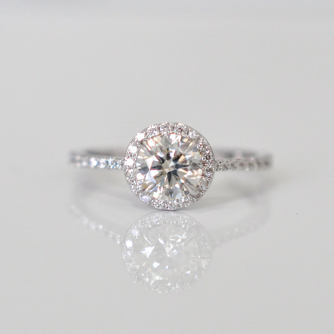 white diamonds (~1 ct. tw.) halo engagement ring