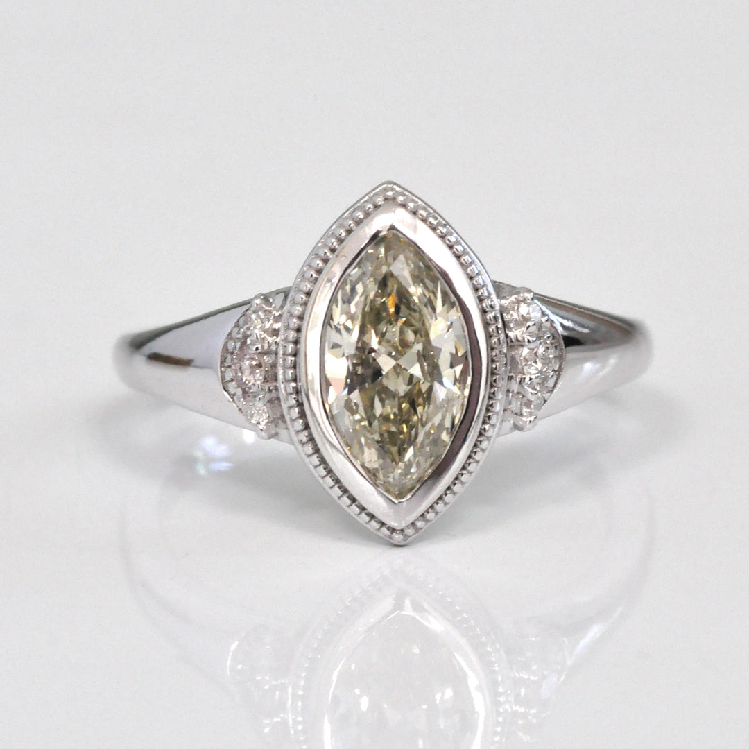 white gold bezel set marquise center diamond ring